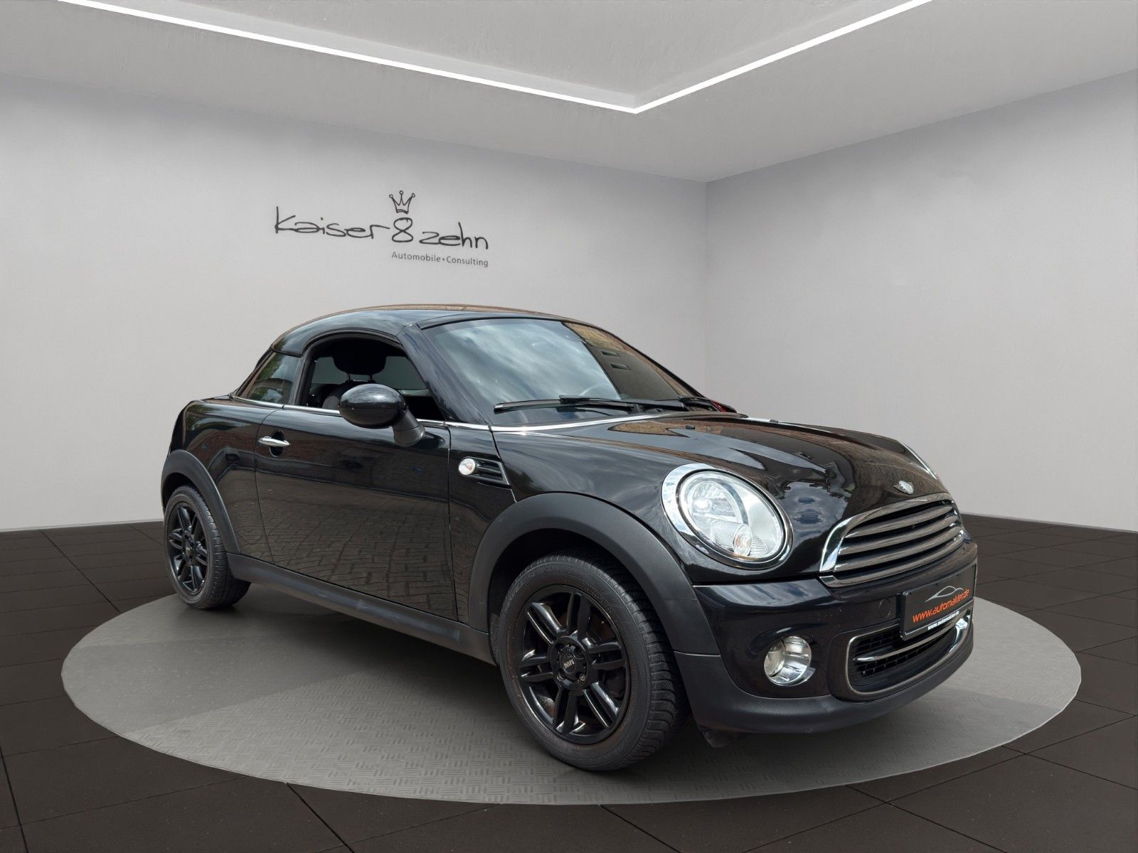 Fahrzeugabbildung MINI Cooper Coupé *Teilleder* *PDC*